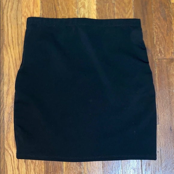 Tight Black Skirt with stripe design on side - Picture 1 of 3